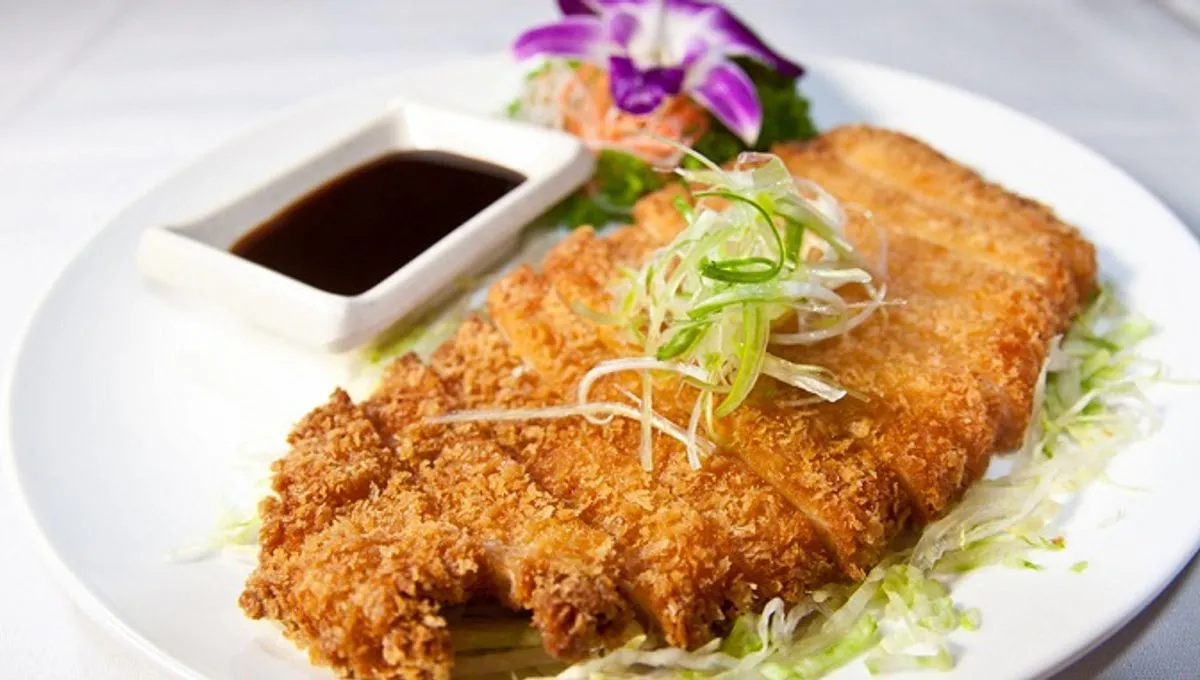Crispy pork katsu cutlet with tonkatsu sauce at Hibachi Japanese Steakhouse in Huntington